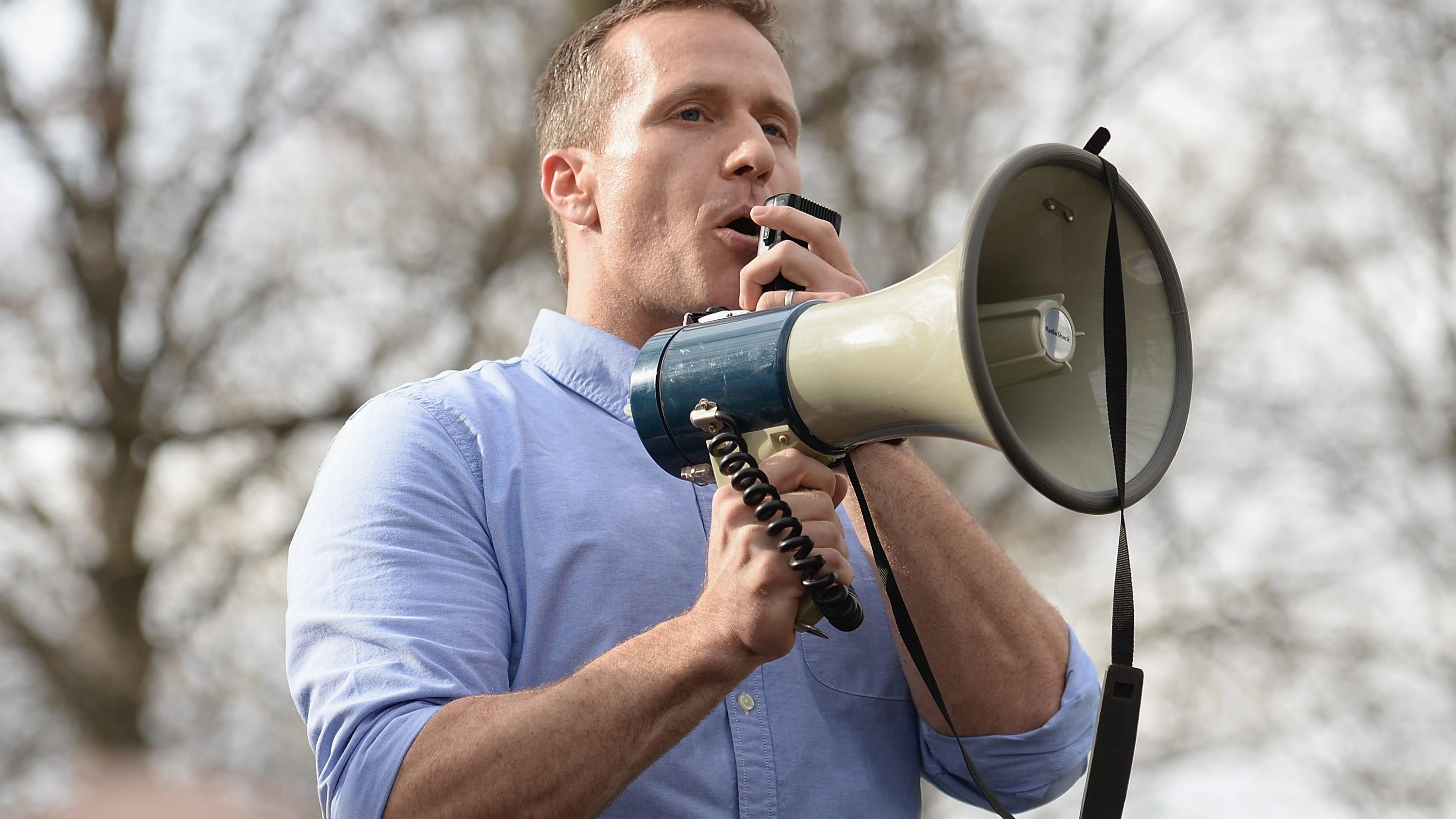 An armed Eric Greitens goes "RINO hunting" in new campaign ad