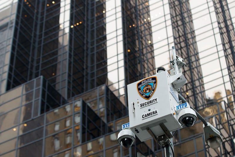 A New York City Police Department (NYPD) security camera hangs atop a light pole across the street from Trump Tower, March 7, 2017 in New York City. 