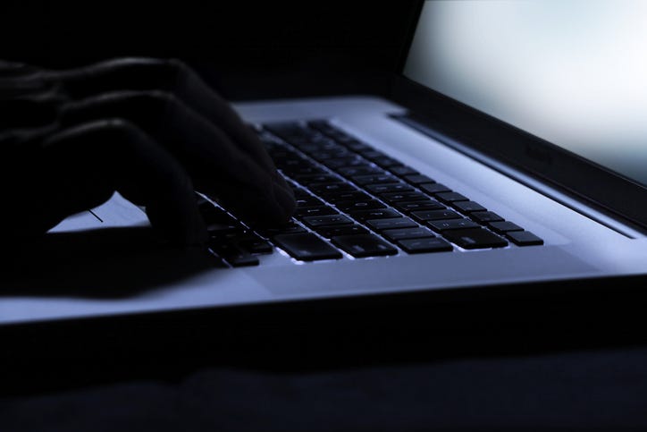 using a laptop in the dark