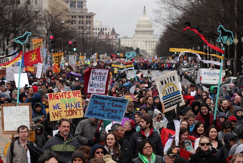 Activists participate in a protest against the Dakota Access Pipeline March 10, 2017 in Washington, DC. The Standing Rock Sioux Tribe held the event with a march to the White House to urge for halting the construction of the project. (Photo by Alex Wong/Getty Images)
