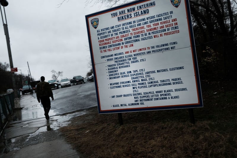 A man enters the road to Rikers Island on March 31, 2017 in New York City.