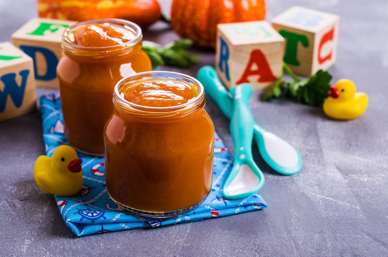 Homemade baby food from pumpkin and carrots. Selective focus.