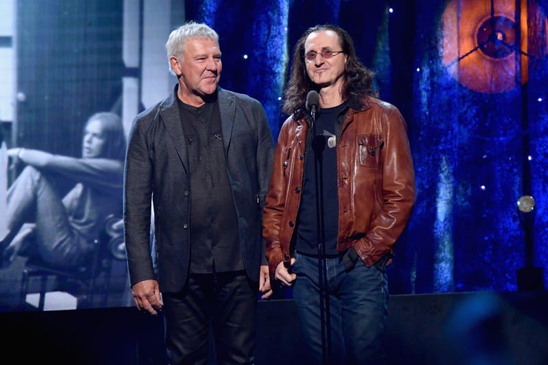 : Presenters Alex Lifeson and Geddy Lee of Rush speak onstage at the 32nd Annual Rock & Roll Hall Of Fame Induction Ceremony at Barclays Center on April 7, 2017 in New York City. 