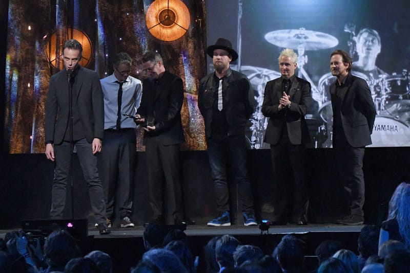 Inductees Eddie Vedder, Dave Krusen, Stone Gossard, Jeff Ament, Mike McCready and Matt Cameron of Pearl Jam speak onstage at the 32nd Annual Rock & Roll Hall Of Fame Induction Ceremony at Barclays Center on April 7, 2017 in New York City
