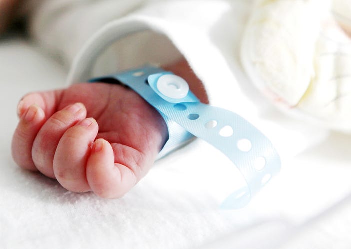 Newborn hand. 