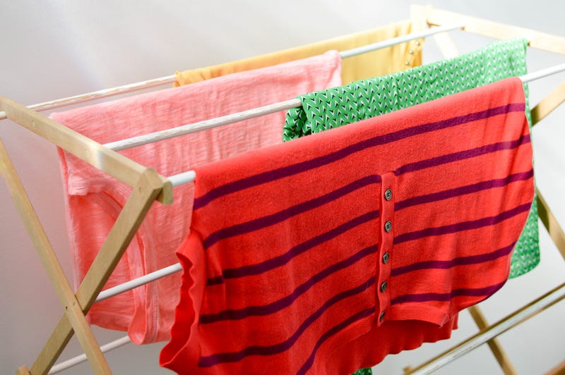 Laundry Drying on a Clothes Rack Indoors