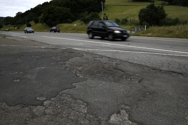 A pothole is visible on a road on April 25, 2017 in San Rafael, California.
