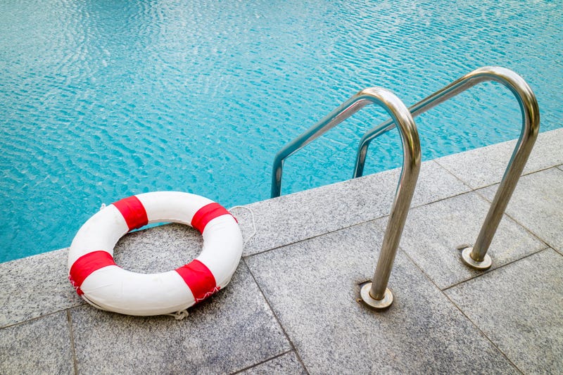 Pool with life preserver