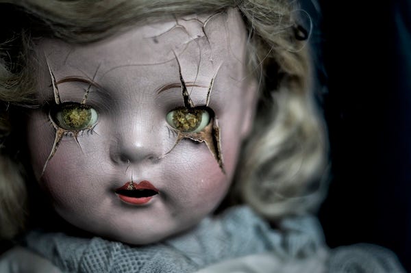 Haunted, antique doll