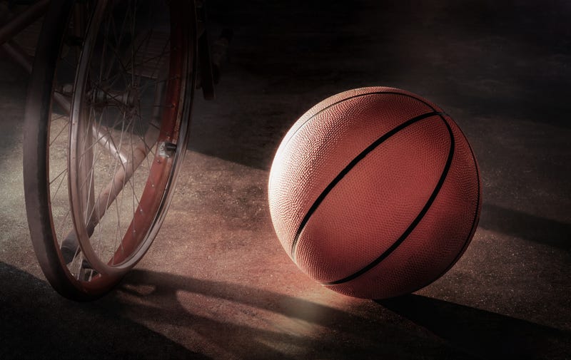 A wheelchair and a basketball.