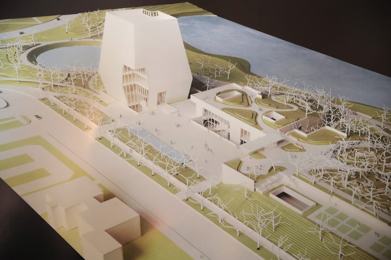 A rendering of the proposed Obama Presidential Center, which is scheduled to be built in nearby Jackson Park, is displayed at the South Shore Cultural Center during a roundtable discussion moderated by former President Barack Obama on May 3, 2017 in Chicago, Illinois. The Presidential Center design envisions three buildings, a museum, library and forum. Obama was accompanied at the event by his wife Michelle who was making her first trip back to Chicago since leaving the White House in January. 