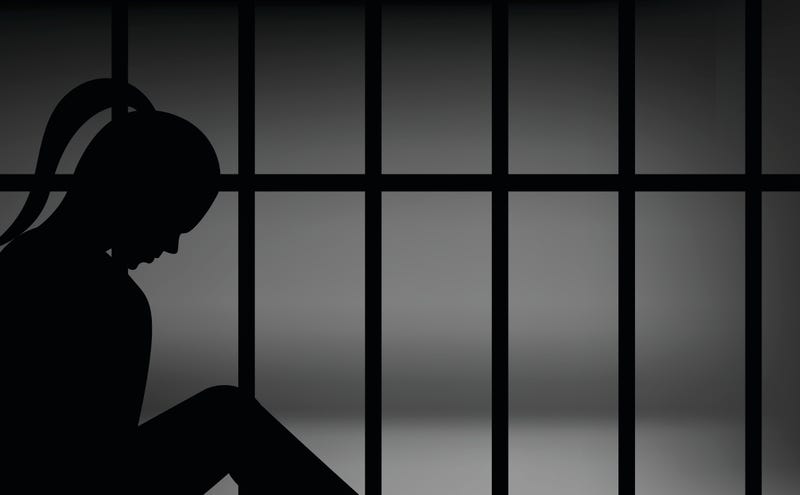 A woman in jail.