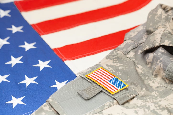 US army uniform with chevron over flag
