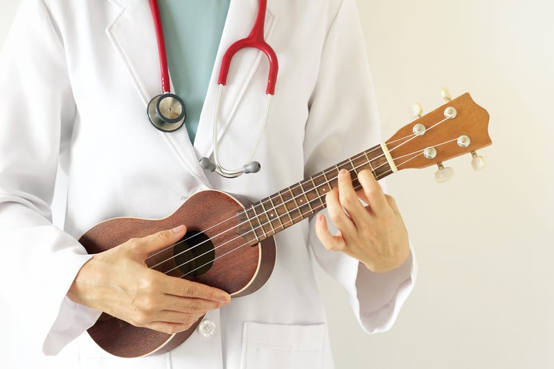 Doctor playing ukulele