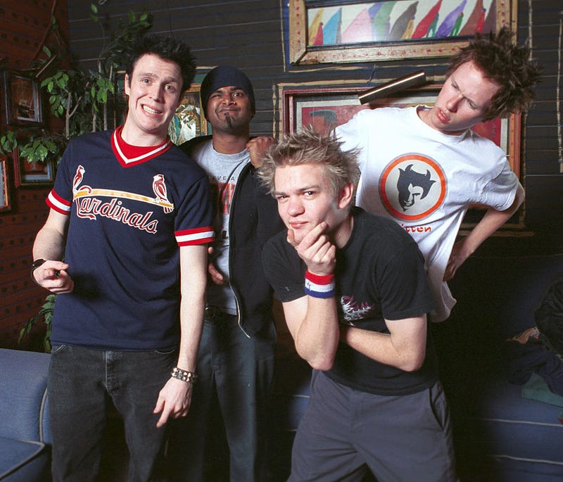 Sum 41 band members Steve Jocz, Dave Baksh, Deryck Whibley, and Cone McCaslin pose backstage January 18, 2002 before performing at the House of Blues in Las Vegas, NV.