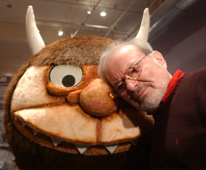 Maurice Sendak standing with a character from his book, "Where the Wild Things Are," on January 11, 2002.