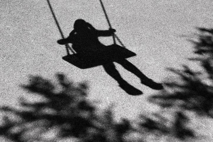 girl on swing