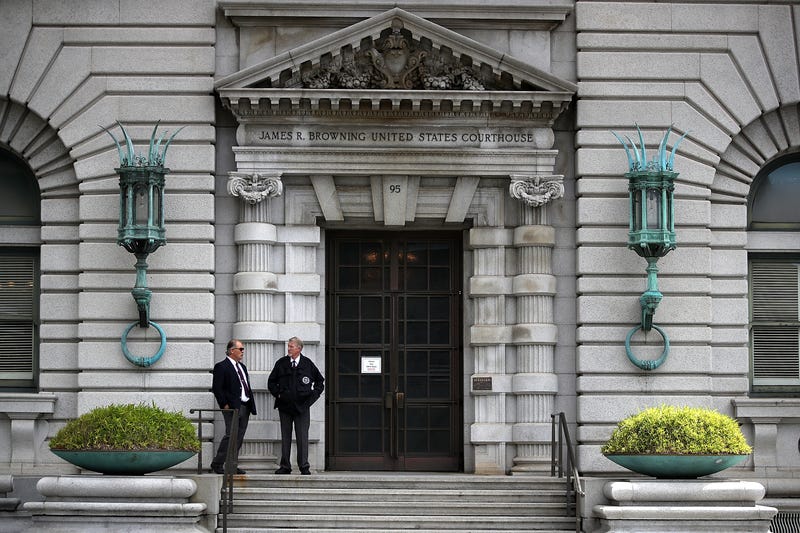 Security guards stand in front of the Ninth U.S. Circuit Court of Appeals on June 12, 2017 in San Francisco, California.