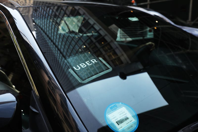 An Uber car waits for a client in Manhattan a day after it was announced that Uber co-founder Travis Kalanick will take a leave of absence as chief executive on June 14, 2017 in New York City. 
