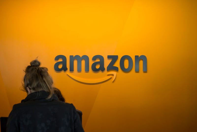 A visitor checks in at the Amazon corporate headquarters on June 16, 2017 in Seattle, Washington.