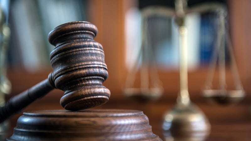 A gavel in a courtroom.