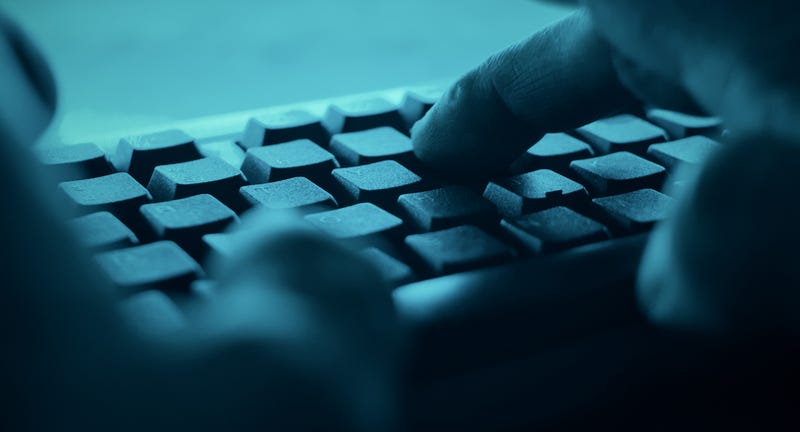Person typing. 