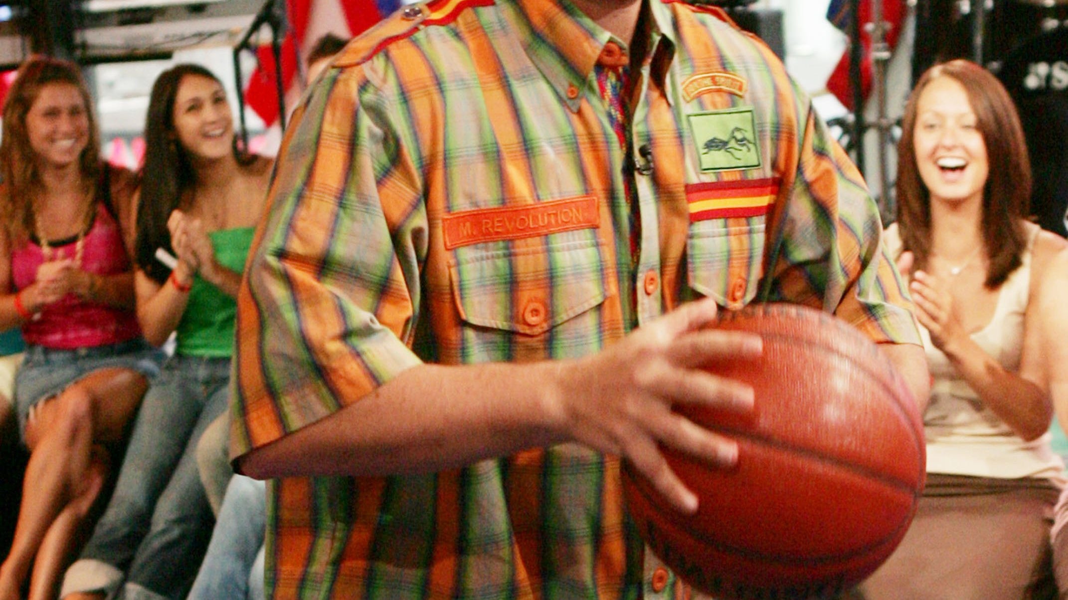 Adam Sandler spotted playing pick-up hoops in a polo shirt