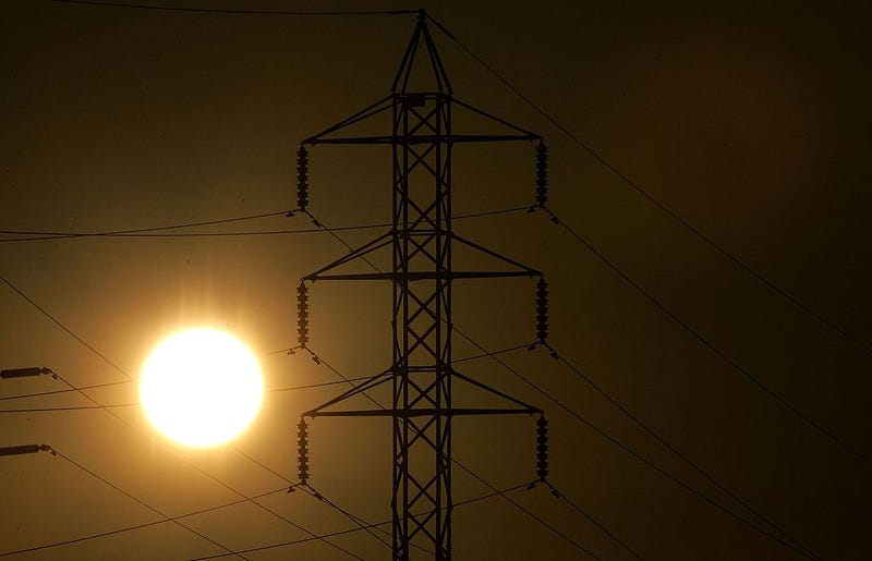 Power towers are seen as the sun sets July 24, 2006 in San Rafael, California.