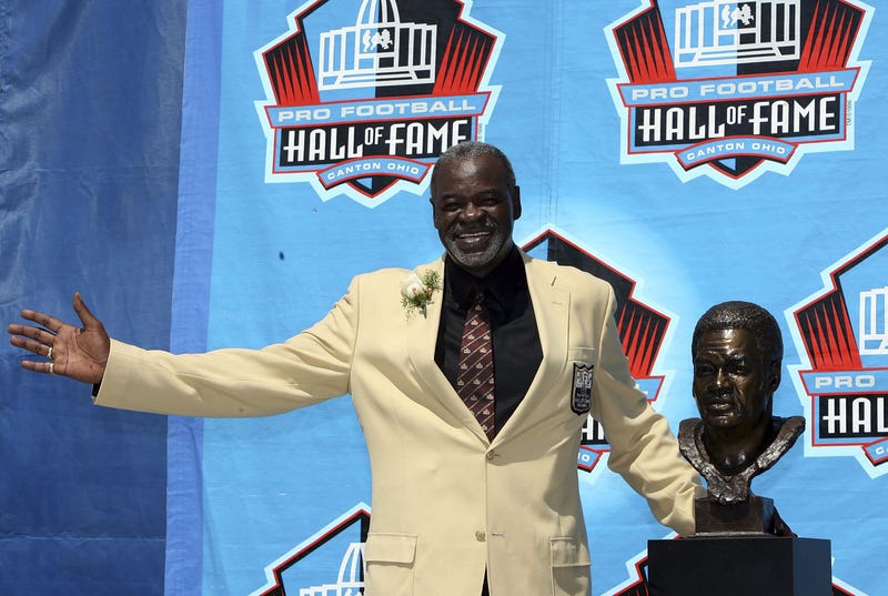 Rayfield Wright of the Dallas Cowboys poses with his bust after his induction during the Class of 2006 Pro Football Hall of Fame Enshrinement Ceremony at Fawcett Stadium on Aug. 5, 2006 in Canton, Ohio.