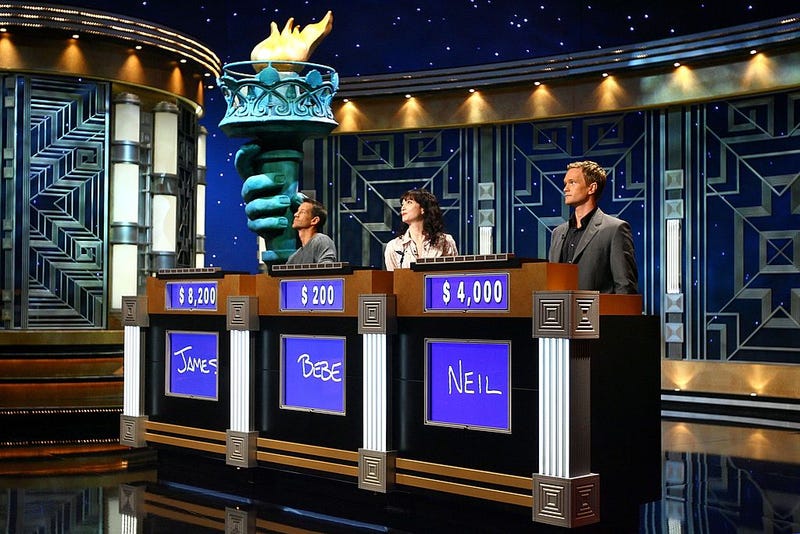 FILE - (L-R) Actors James Denton, Bebe Neuwirth and Neil Patrick Harris during a rehearsal for Celebrity Jeopardy at Radio City Music Hall on October 08, 2006 in New York City.