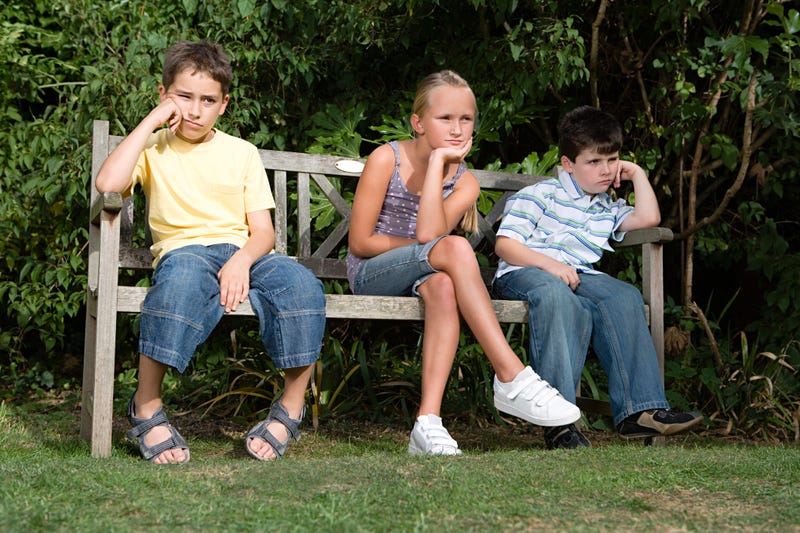 Bored children outdoors