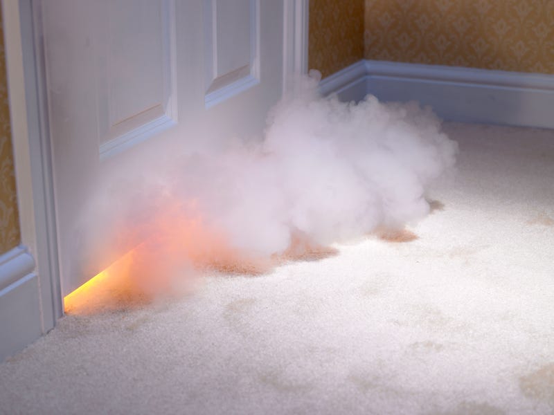 Smoke coming in under door