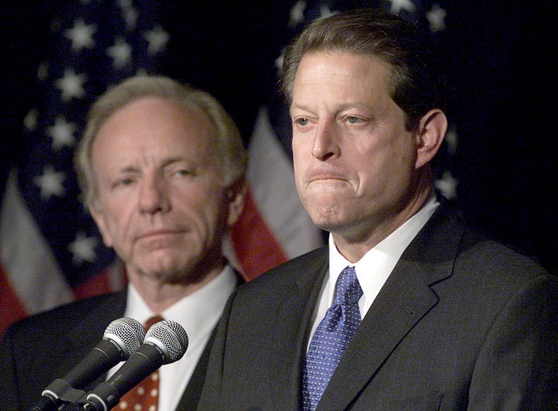 Vice President Al Gore with Sen. Joseph Lieberman by his side makes a statement to reporters, November 8, 2000 in Nashville TN. A sharply and bitterly divided U.S. Supreme Court ruled December 13, 2000 for Republican George W. Bush, halting any more recounts of ballots in Florida and dealing a crushing setback to Democrat Al Gore's hopes of winning the presidency. (Photo by Mark Wilson/Newsmakers)