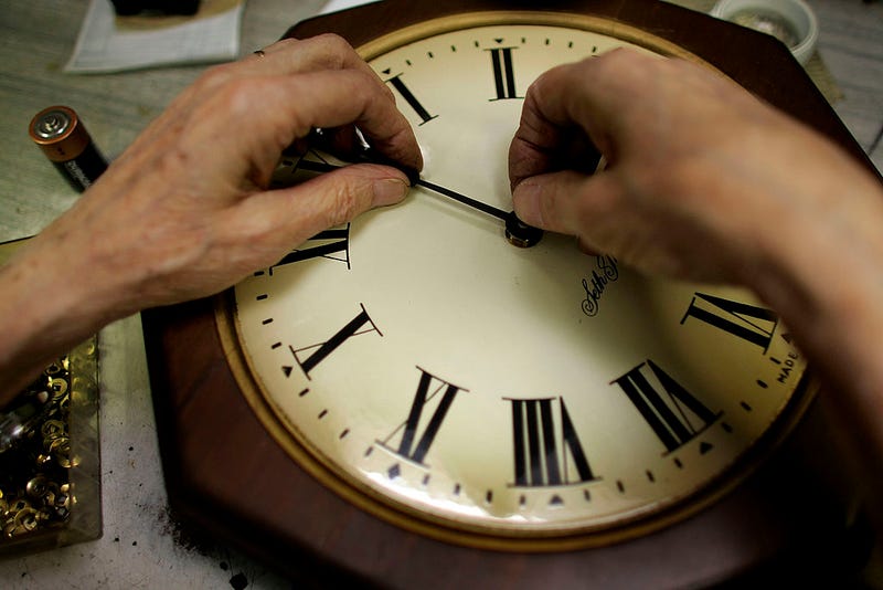 Howard Brown repairs a clock at Browns Old Time Clock Shop March 6, 2007 in Plantation, Florida.