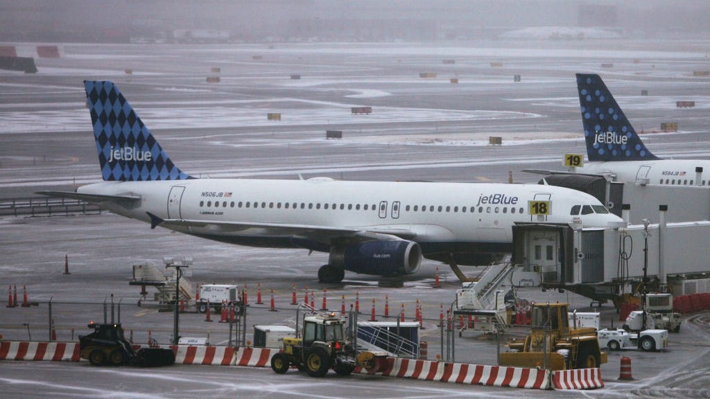 Passenger laptop fire forces plane evacuation at JFK Airport