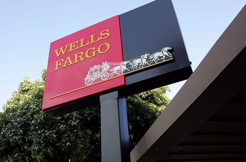 The Wells Fargo logo is seen on a sign outside of a Wells Fargo Home Mortgage branch office March 20, 2007 in San Francisco, California.