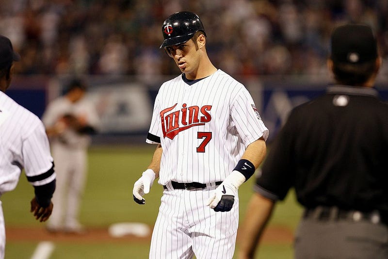 Joe Mauer #7 of the Minnesota Twins stands near first base during the Opening Day game against the Baltimore Orioles on April 2, 2007 at the Metrodome in Minneapolis, Minnesota. The Twins won 7-4.