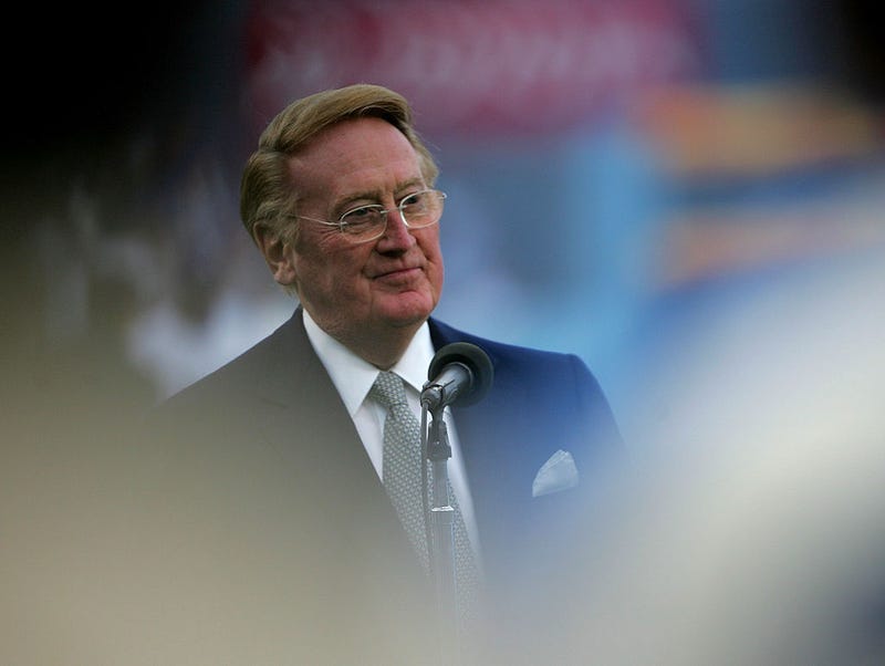 Hall of Fame broadcaster Vin Scully speaks during ceremonies honoring Jackie Robinson before the game between the San Diego Padres and the Los Angeles Dodgers on April 15, 2007 at Dodger Stadium in Los Angeles, California.
