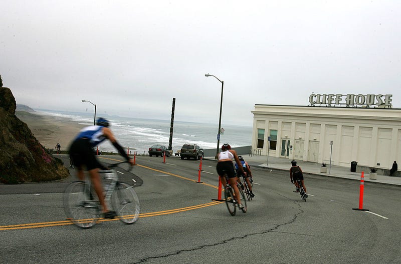 Athletes race down the Great Highway during the bike portion of the Escape from Alcatraz Triathlon on June 3, 2007 in San Francisco, California.