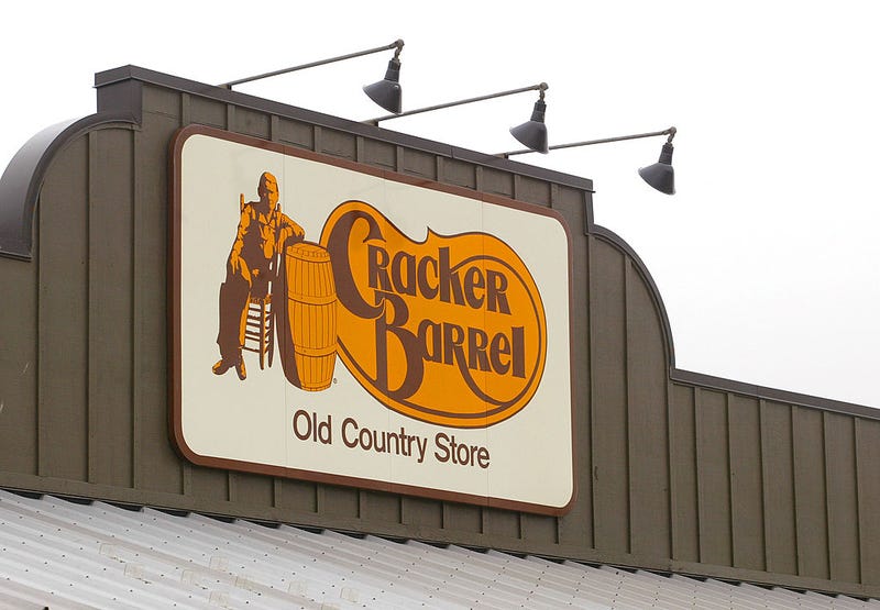 A Cracker Barrel Old Country Store sign is visible atop one of its restaurant stores April 12, 2002.