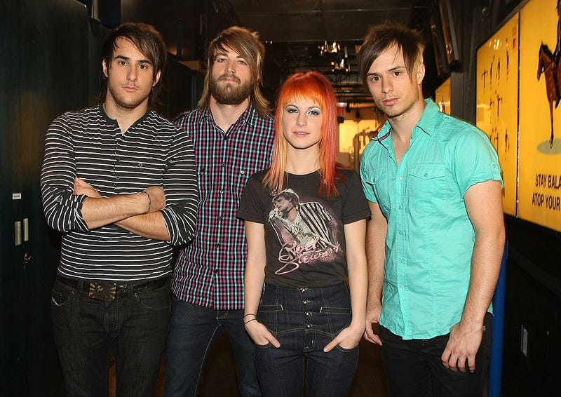 Zac Farro, Jeremy Davis, Haley Williams, and Josh Farro of Paramore pose backstage during MTV's Total Request Live at the MTV Times Square Studios on October 9, 2007 in New York City.