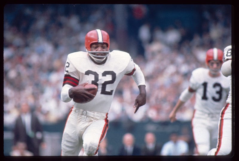 Cleveland Browns Hall of Fame running back Jim Brown runs with the football in this undated photo.