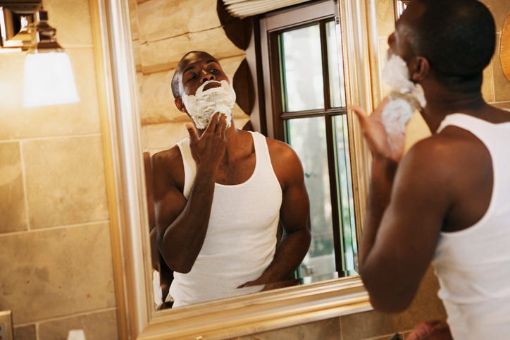 man shaving during springtime