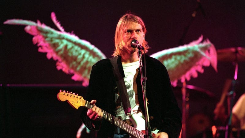 Kurt Cobain playing Fender guitar