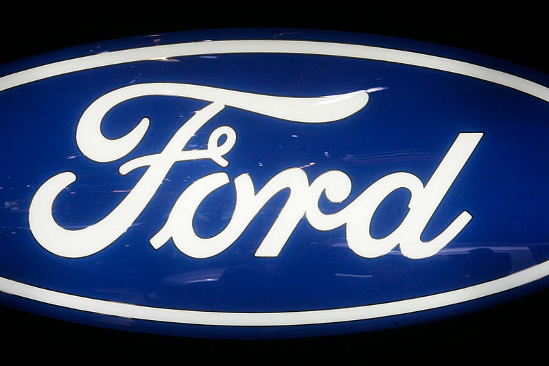 FILE - The Ford corporate logo is seen at the International Car Show on Jan. 22, 2008 in Brussels, Belgium.