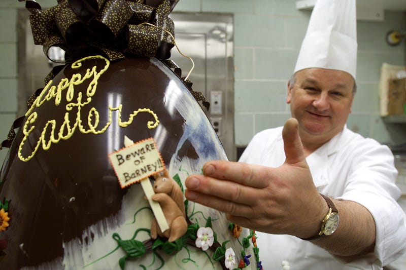 White House Pastry Chef Roland Mesnier puts the finishing touches on a 50 pound chocolate Easter egg for the annual White House Easter Egg Roll April 13, 2001 in Washington, D,C.