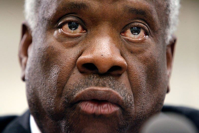 U.S. Supreme Court Justice Clarence Thomas testifies before the House Financial Services and General Government Subcommittee on Capitol Hill March 13, 2008 in Washington, DC. Thomas and Justice Anthony Kennedy spoke about concerns with the ongoing remodeling of the court building, the reduction of paperwork due to electronic media and the disparity of pay between federal judges and lawyers working in the private sector. (Photo by Chip Somodevilla/Getty Images)