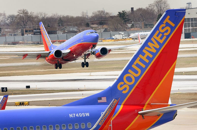 A Sacramento woman has been charged with assault for allegedly punching a Southwest employee.