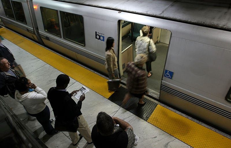 Bay Area Rapid Transit (BART) passengers board a train at the Powell Street station May 12, 2008 in San Francisco, California. 