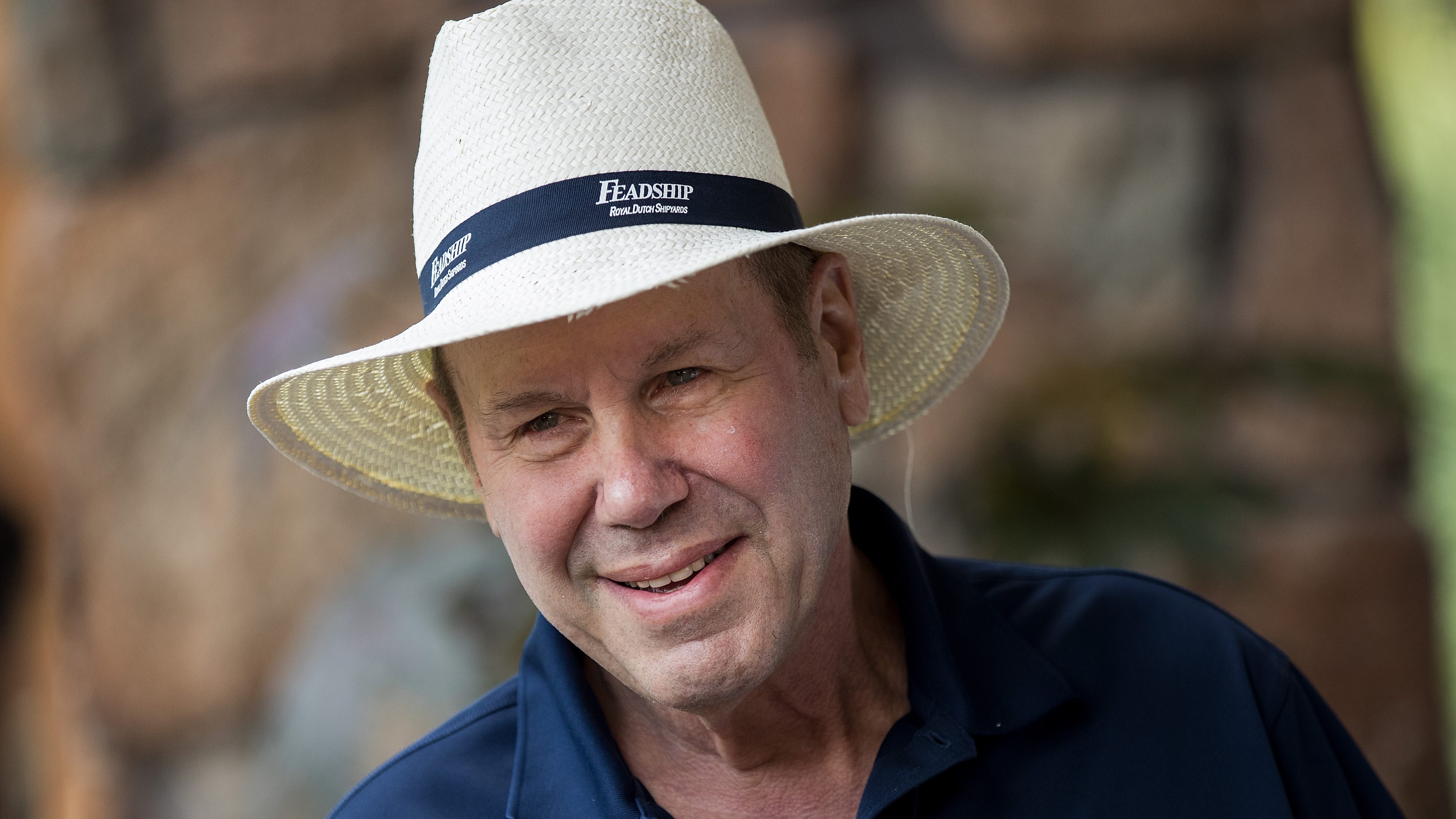 Ex-Disney CEO's former handyman tentatively settles discrimination suit